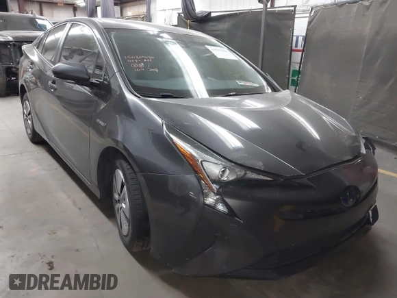 2018 Toyota Prius Two with VIN JTDKARFU6J3553871, listed as a IAAI auction lot 41577636 with 118,715 mi miles. Bid and sale history available at carsss.com. Image 1.