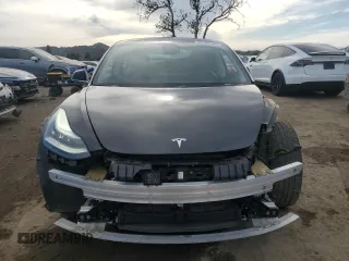2019 Tesla Model 3 Long Range with VIN 5YJ3E1EB1KF212019, listed as a Copart auction lot 50134385 with 83,478 mi miles and Salvage Title. Bid and sale history available at DreamBid. Image 5.