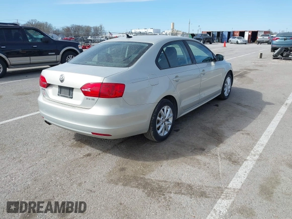 2011 Volkswagen Jetta SE with VIN 3VWDZ7AJXBM098328, listed as a IAAI auction lot 41819874 with 133,877 mi miles and . Bid and sale history available at DreamBid. Image 4.