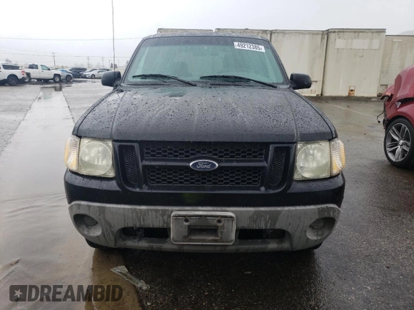2001 Ford Explorer Sport z VIN 1FMYU60E11UC18170, wystawiony jako Copart lot #49212385 z przebiegiem 219 383 mil mil oraz Tytuł czysty. Historia ofert i sprzedaży dostępna na DreamBid. Obrazek 5.