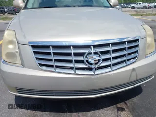 2008 Cadillac DTS 1SC with VIN 1G6KD57Y38U100381, listed as a IAAI auction lot 42173059 with 146,669 mi miles and . Bid and sale history available at carsss.com. Image 12.
