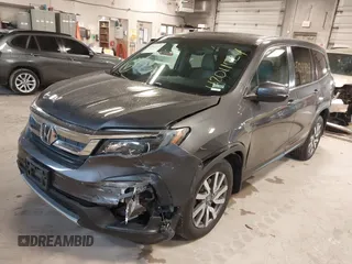 2019 Honda Pilot EX-L with VIN 5FNYF6H50KB035548, listed as a IAAI auction lot 42011724 with 105,195 mi miles and . Bid and sale history available at DreamBid. Image 6.