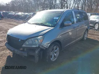 2006 Honda Odyssey TOURING with VIN 5FNRL38846B059685, listed as a IAAI auction lot 41831849 with 999,999 mi miles. Bid and sale history available at carsss.com. Image 2.