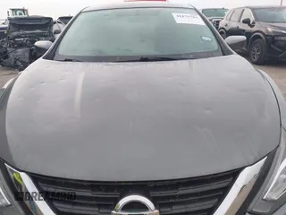 2018 Nissan Altima 2.5 SR with VIN 1N4AL3AP3JC165961, listed as a IAAI auction lot 41875782 with 56,252 mi miles. Bid and sale history available at carsss.com. Image 6.