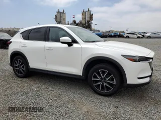 2018 Mazda CX-5 Grand Touring with VIN JM3KFADMXJ1358221, listed as a Copart auction lot 59746545 with 54,094 mi miles and Salvage title. Bid and sale history available at DreamBid. Image 4.