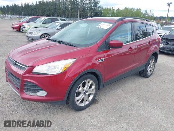 2013 Ford Escape SE with VIN 1FMCU9GXXDUB73916, listed as a IAAI auction lot 42086263 with 176,226 mi miles and . Bid and sale history available at DreamBid. Image 2.