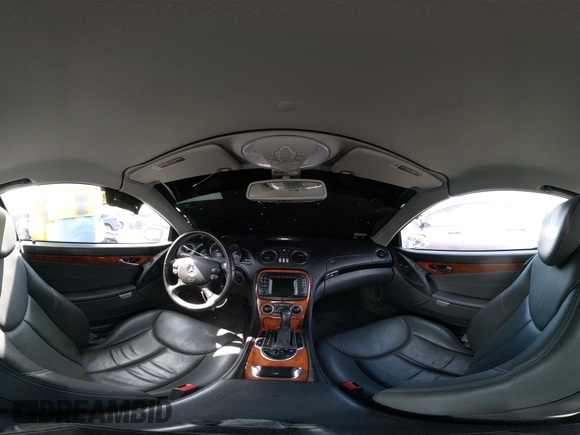 2004 Mercedes-Benz SL 500 with VIN WDBSK75F44F071115, listed as a IAAI auction lot 42565805 with 80,201 mi miles and . Bid and sale history available at DreamBid. Image 18.