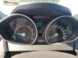 2014 Ford Fiesta SE z VIN 3FADP4BJ6EM130742, wystawiony jako Copart lot #54952305 z przebiegiem 63 353 mil mil oraz Szkoda całkowita • Salvage title. Historia ofert i sprzedaży dostępna na DreamBid. Obrazek 9.