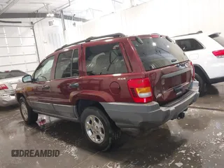2000 Jeep Grand Cherokee Laredo z VIN 1J4GW48N8YC151600, wystawiony jako IAAI lot #42178535 z przebiegiem 71 207 mil mil oraz . Historia ofert i sprzedaży dostępna na DreamBid. Obrazek 14.