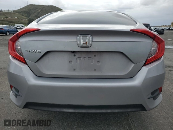 2018 Honda Civic LX with VIN 2HGFC2F56JH586783, listed as a Copart auction lot 48213265 with 103,574 mi miles and Salvage Title. Bid and sale history available at DreamBid. Image 6.
