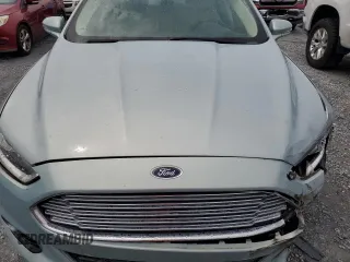 2013 Ford Fusion SE Hybrid z VIN 3FA6P0LU6DR174719, wystawiony jako Copart lot #62877715 z przebiegiem 52 884 mil mil oraz Szkoda całkowita • Salvage title. Historia ofert i sprzedaży dostępna na DreamBid. Obrazek 11.
