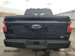 2023 Ford F-150 Lightning Pro with VIN 1FT6W1EV8PWG38071, listed as a Copart auction lot 51091495 with 13,687 mi miles and Salvage title. Bid and sale history available at DreamBid. Image 6.