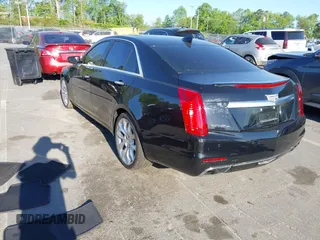 2015 Cadillac CTS Premium AWD with VIN 1G6AZ5S35F0129572, listed as a IAAI auction lot 42045670 with 62,758 mi miles and . Bid and sale history available at DreamBid. Image 3.