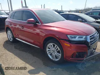 2018 Audi Q5 Premium Plus with VIN WA1BNAFYXJ2077049, listed as a IAAI auction lot 41908063 with 106,215 mi miles. Bid and sale history available at carsss.com. Image 1.