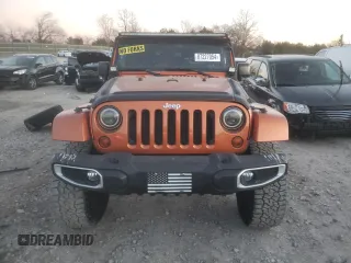 2011 Jeep Wrangler Sahara with VIN 1J4GA5D11BL627667, listed as a Copart auction lot 87227054 with 124,009 mi miles and Clean Title. Bid and sale history available at DreamBid. Image 5.