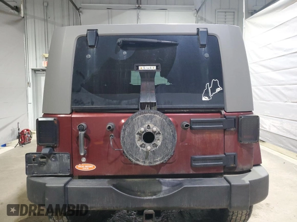 2007 Jeep Wrangler Unlimited Sahara с VIN 1J4GA591X7L198917, выставлен на аукционе Copart как лот 53311565 с пробегом 244 368 миль миль и Списание • Salvage title. История ставок и продаж доступна на DreamBid. Изображение 6.
