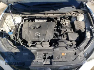 2014 Mazda CX-5 Grand Touring with VIN JM3KE4DY6E0376413, listed as a Copart auction lot 53204935 with 126,791 mi miles and Salvage Title. Bid and sale history available at DreamBid. Image 12.