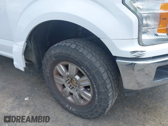 2018 Ford F-150 XL with VIN 1FTEW1E50JKC91068, listed as a IAAI auction lot 42221345 with 135,095 mi miles and . Bid and sale history available at DreamBid. Image 17.