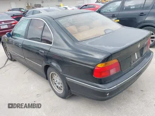 1997 BMW 5 Series 528i z VIN WBADD6321VBW05322, wystawiony jako IAAI lot #42284323 z przebiegiem 200 441 mil mil oraz . Historia ofert i sprzedaży dostępna na DreamBid. Obrazek 3.