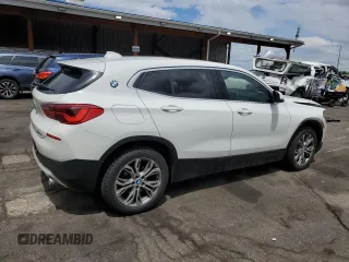 2018 BMW X2 xDrive28i z VIN WBXYJ5C38JEF79686, wystawiony jako Copart lot #56988735 z przebiegiem 103 799 mil mil oraz Szkoda całkowita • Salvage title. Historia ofert i sprzedaży dostępna na DreamBid. Obrazek 3.