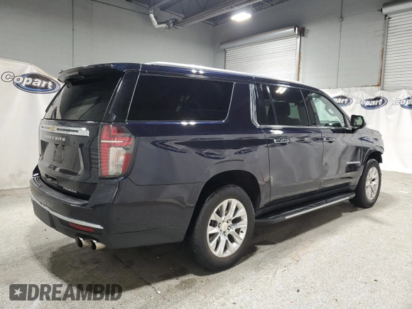 2023 Chevrolet Suburban Premier z VIN 1GNSCFKD4PR527765, wystawiony jako Copart lot #61022915 z przebiegiem 47 728 mil mil oraz Czysty tytuł • Clean title. Historia ofert i sprzedaży dostępna na DreamBid. Obrazek 3.