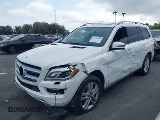 2014 Mercedes-Benz GL 450 z VIN 4JGDF7CE0EA424081, wystawiony jako IAAI lot #42359465 z przebiegiem 145 363 mil mil oraz . Historia ofert i sprzedaży dostępna na DreamBid. Obrazek 20.