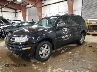 2002 Oldsmobile Bravada z VIN 1GHDT13S522107056, wystawiony jako Copart lot #86296454 z przebiegiem 169 856 mil mil oraz Tytuł czysty. Historia ofert i sprzedaży dostępna na DreamBid. Obrazek 1.