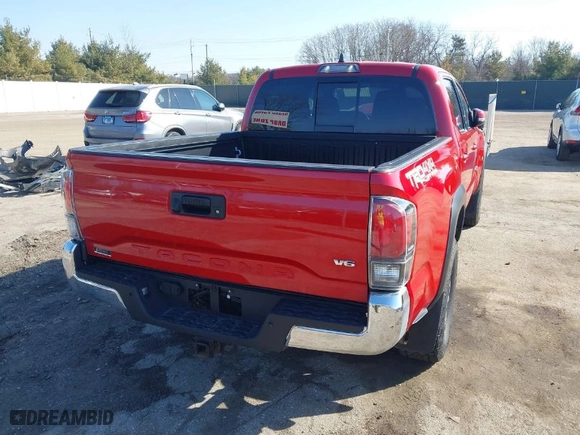 2020 Toyota Tacoma 4WD SR5 with VIN 3TMCZ5AN5LM347979, listed as a IAAI auction lot 41780490 with 58,886 mi miles. Bid and sale history available at carsss.com. Image 4.