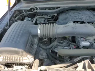 2021 Ram 1500 Lone Star z VIN 1C6SRFFTXMN808729, wystawiony jako Copart lot #70363725 z przebiegiem 72 058 mil mil oraz Szkoda całkowita • Salvage title. Historia ofert i sprzedaży dostępna na DreamBid. Obrazek 15.