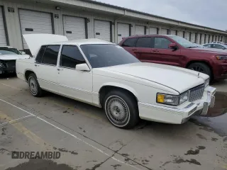 1990 Cadillac Fleetwood z VIN 1G6CB5332L4248633, wystawiony jako Copart lot #44218444 z przebiegiem 40 635 mil mil oraz Nie do naprawy. Historia ofert i sprzedaży dostępna na DreamBid. Obrazek 4.
