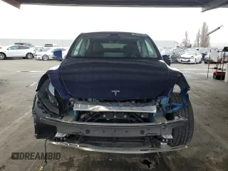 2024 Tesla Model Y Long Range with VIN 7SAYGDEE6RF025366, listed as a Copart auction lot 49328055 with 10,319 mi miles and Salvage Title. Bid and sale history available at DreamBid. Image 5.