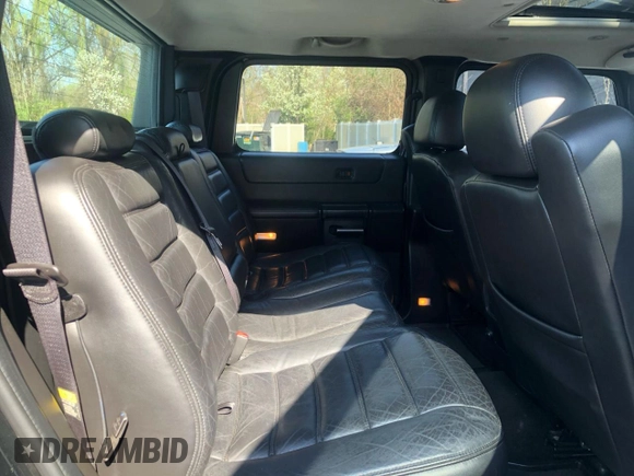 2006 Hummer H2 with VIN 5GRGN22U56H102463, listed as a Copart auction lot 54819425 with 100,096 mi miles and Clean Title. Bid and sale history available at carsss.com. Image 11.