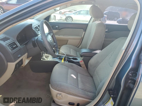 2012 Ford Fusion SE with VIN 3FAHP0HA6CR138972, listed as a Copart auction lot 57448985 with 237,398 mi miles and Salvage title. Bid and sale history available at DreamBid. Image 7.