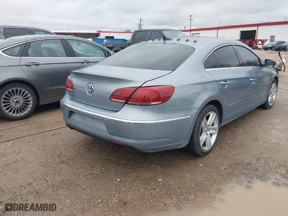 2013 Volkswagen CC Sport with VIN WVWBN7AN7DE503417, listed as a IAAI auction lot 41205584 with 185,437 mi miles. Bid and sale history available at carsss.com. Image 4.