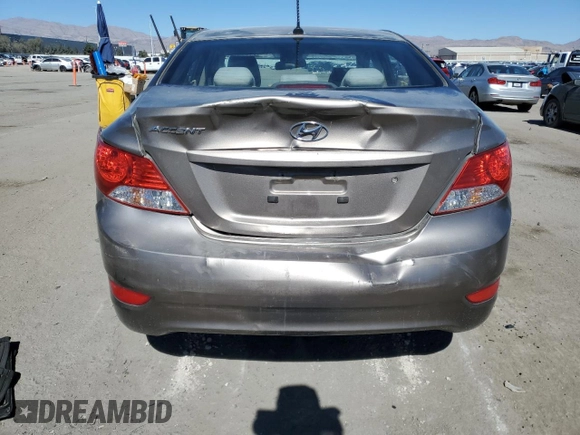 2014 Hyundai Accent GLS z VIN KMHCT4AE5EU623745, wystawiony jako Copart lot #47214905 z przebiegiem Nie podano mil oraz Szkoda całkowita • Salvage title. Historia ofert i sprzedaży dostępna na DreamBid. Obrazek 6.