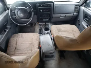 1997 Jeep Cherokee SE с VIN 1J4FJ28S5VL509588, выставлен на аукционе Copart как лот 56181695 с пробегом 313 430 миль миль и Списание • Salvage title. История ставок и продаж доступна на DreamBid. Изображение 8.