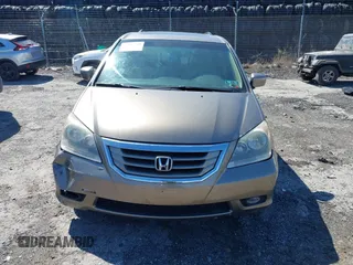 2010 Honda Odyssey Touring with VIN 5FNRL3H9XAB094765, listed as a IAAI auction lot 41892743 with 127,143 mi miles. Bid and sale history available at carsss.com. Image 12.