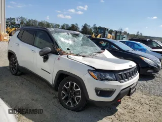 2020 Jeep Compass Trailhawk with VIN 3C4NJDDB9LT202929, listed as a Copart auction lot 74689854 with 87,343 mi miles and Salvage Title. Bid and sale history available at carsss.com. Image 4.