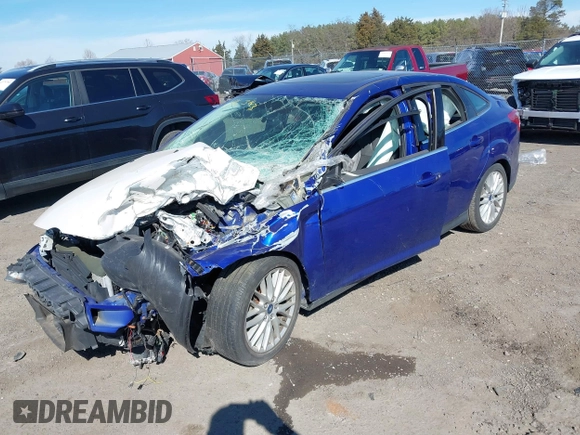 2014 Ford Focus Titanium with VIN 1FADP3J21EL427066, listed as a IAAI auction lot 41653163 with 1 mi miles. Bid and sale history available at carsss.com. Image 2.