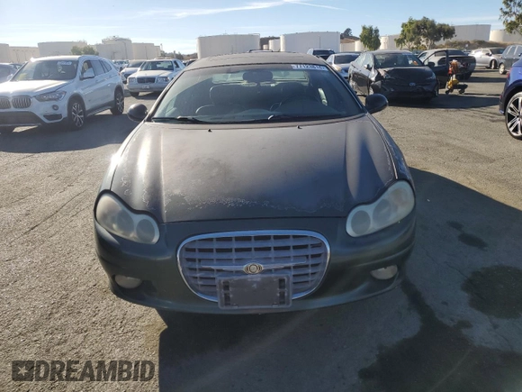 2001 Chrysler LHS z VIN 2C3AC56G31H606648, wystawiony jako Copart lot #77123814 z przebiegiem 83 574 mil mil oraz Tytuł czysty. Historia ofert i sprzedaży dostępna na DreamBid. Obrazek 5.