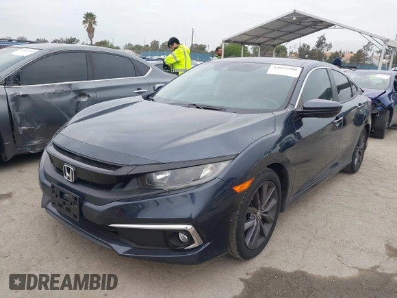 2020 Honda Civic Sedan EX-L with VIN 19XFC1F74LE209538, listed as a IAAI auction lot 42035988 with 51,893 mi miles. Bid and sale history available at carsss.com. Image 17.