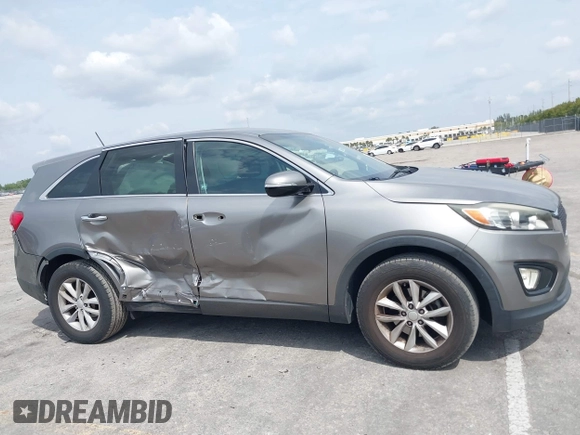 2016 Kia Sorento LX with VIN 5XYPG4A36GG171527, listed as a IAAI auction lot 41872641 with 95,012 mi miles and . Bid and sale history available at DreamBid. Image 6.