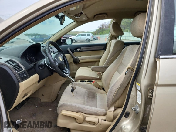 2009 Honda CR-V LX z VIN 5J6RE48309L006028, wystawiony jako Copart lot #58186465 z przebiegiem 214 896 mil mil oraz Szkoda całkowita • Salvage title. Historia ofert i sprzedaży dostępna na DreamBid. Obrazek 7.