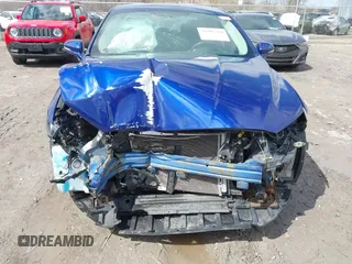 2014 Ford Fusion SE with VIN 1FA6P0H70E5363079, listed as a IAAI auction lot 41987310 with 128,629 mi miles and . Bid and sale history available at DreamBid. Image 13.