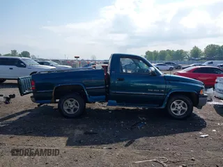 1997 Dodge 1500 z VIN 1B7HC16Y3VJ528095, wystawiony jako IAAI lot #42021646 z przebiegiem 205 375 mil mil oraz . Historia ofert i sprzedaży dostępna na DreamBid. Obrazek 13.