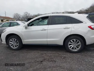 2017 Acura RDX with VIN 5J8TB4H36HL000755, listed as a IAAI auction lot 39087074 with 101,511 mi miles and . Bid and sale history available at DreamBid. Image 14.