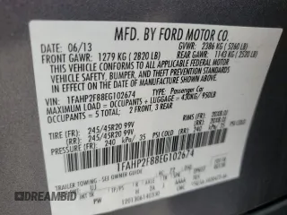 2014 Ford Taurus Limited with VIN 1FAHP2F88EG102674, listed as a Copart auction lot 62841285 with 107,378 mi miles and Salvage title. Bid and sale history available at DreamBid. Image 12.