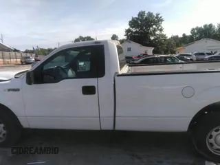 2014 Ford F-150 XL with VIN 1FTMF1CM0EKG51659, listed as a IAAI auction lot 42502648 with 99,450 mi miles and . Bid and sale history available at DreamBid. Image 14.