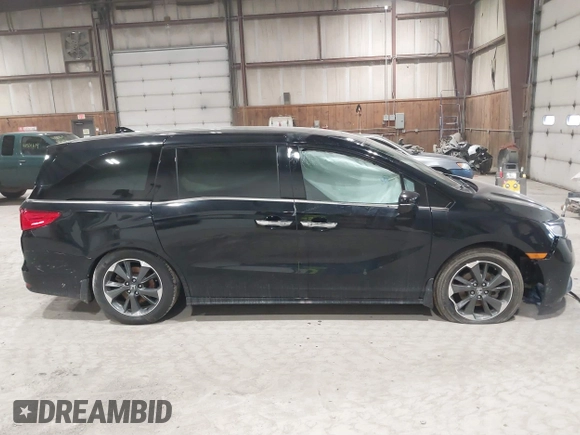 2023 Honda Odyssey Elite z VIN 5FNRL6H95PB016114, wystawiony jako IAAI lot #41865786 z przebiegiem 32 700 mil mil oraz . Historia ofert i sprzedaży dostępna na DreamBid. Obrazek 14.