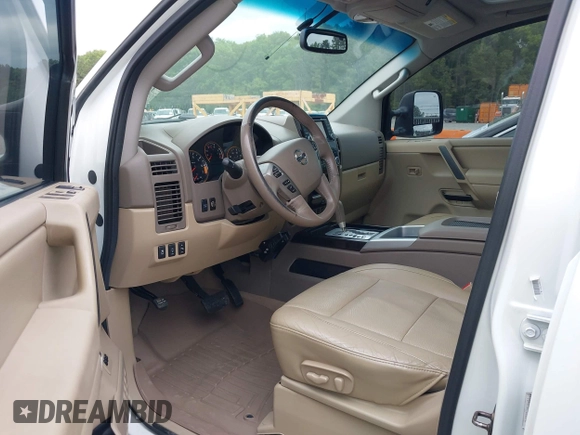 2013 Nissan Titan Pro-4X with VIN 1N6AA0EC7DN312844, listed as a IAAI auction lot 42034411 with Not Provided miles and . Bid and sale history available at DreamBid. Image 5.
